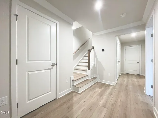 a view of entryway with wooden floor