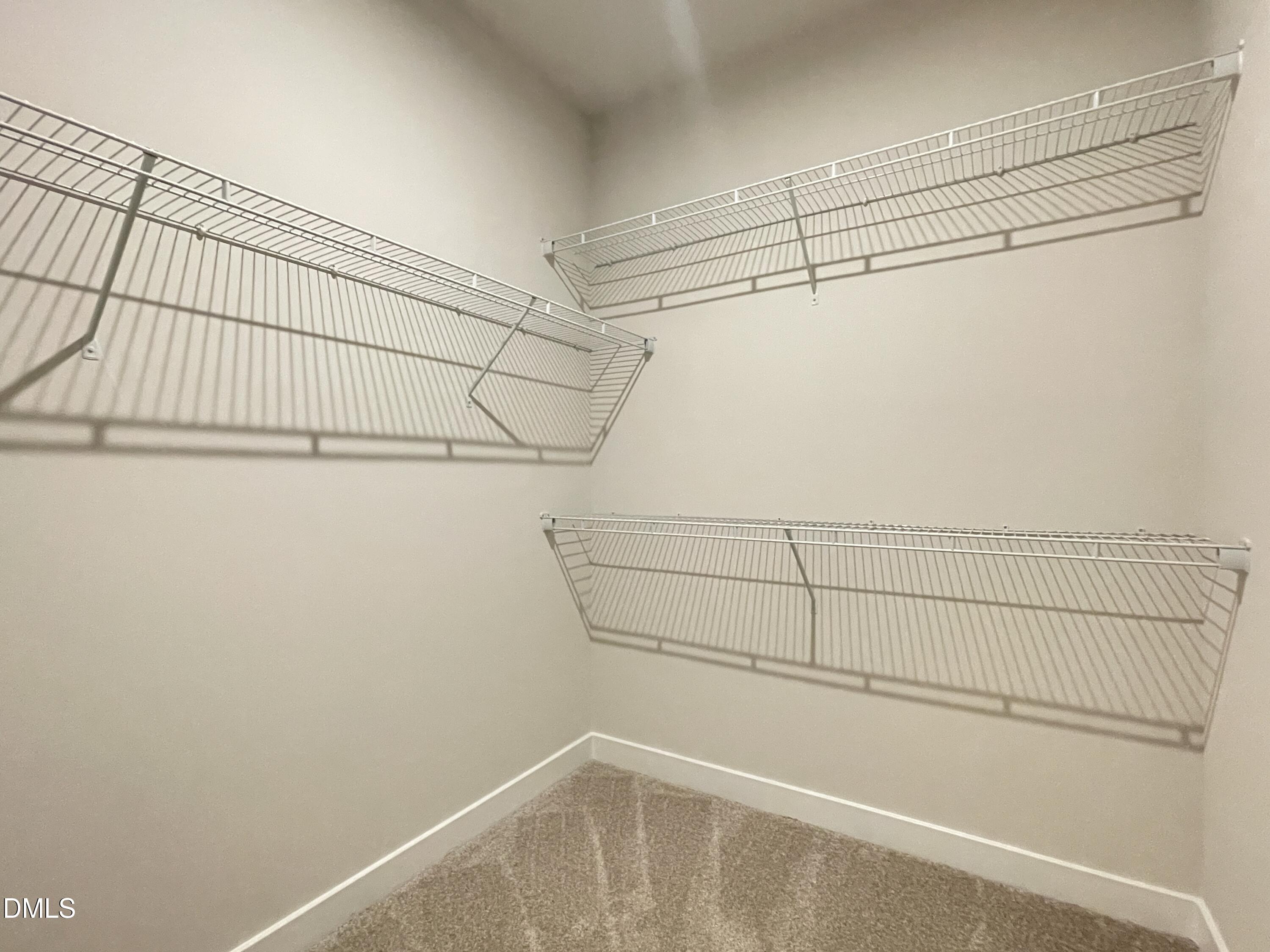 2305 Pitchfork Lane Durham, NC 27713 - Photo 22 of 27 a view of a room with racks on the wall