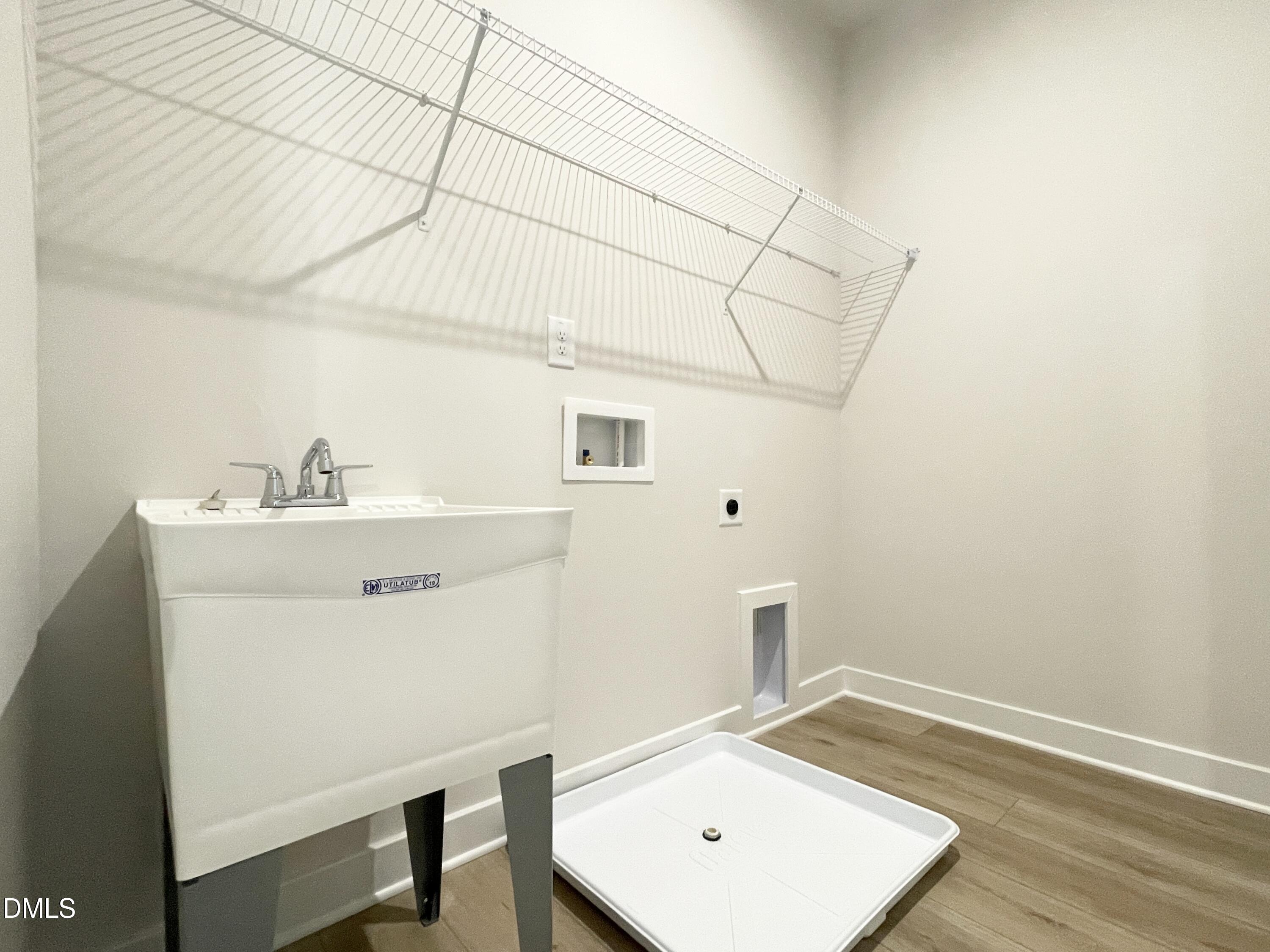 2305 Pitchfork Lane Durham, NC 27713 - Photo 25 of 27 a room with a sink and a mirror