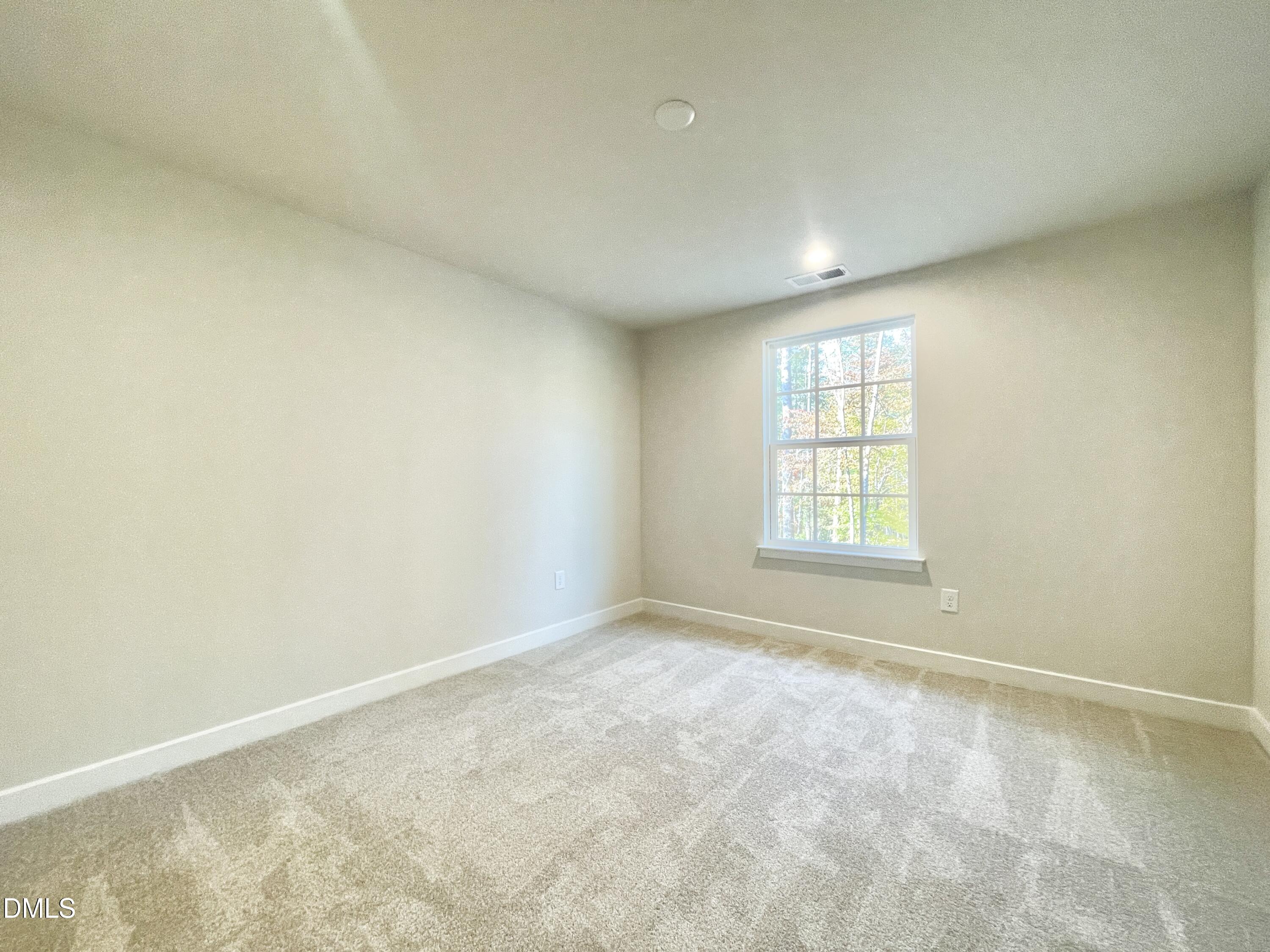2305 Pitchfork Lane Durham, NC 27713 - Photo 4 of 27 an empty room with a window