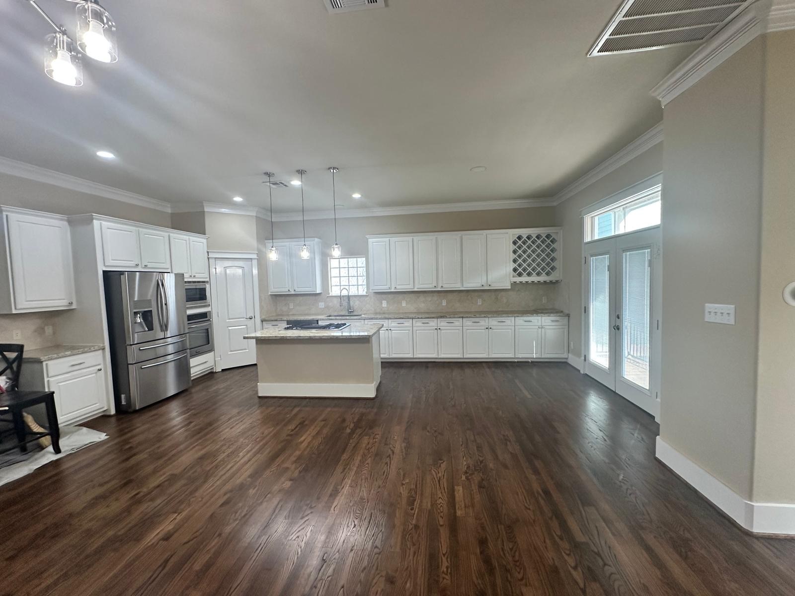 2546 Bevis Street Houston, TX 77008 - Photo 22 of 23 A picture of the updated countertops and flooring in the kitchen.
