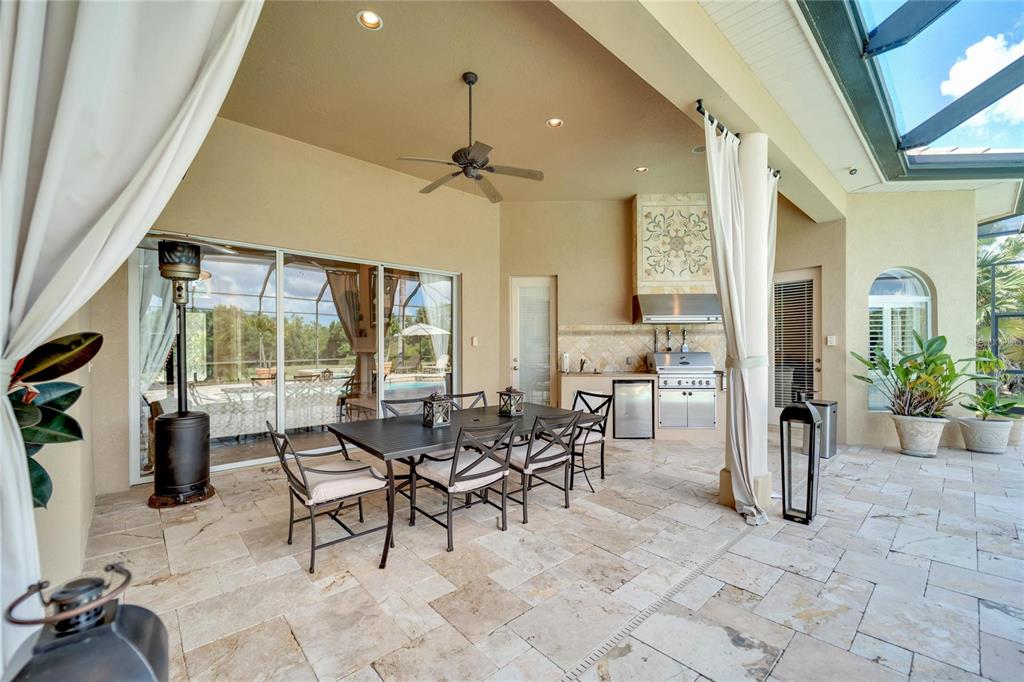 15101 Kestrelglen Way Lithia, FL 33547 - Photo 11 of 75 a view of a livingroom with furniture and floor to ceiling window