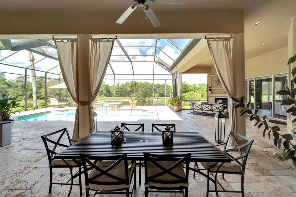 15101 Kestrelglen Way Lithia, FL 33547 - Photo 14 of 75 a view of a dining room with furniture window and outside view