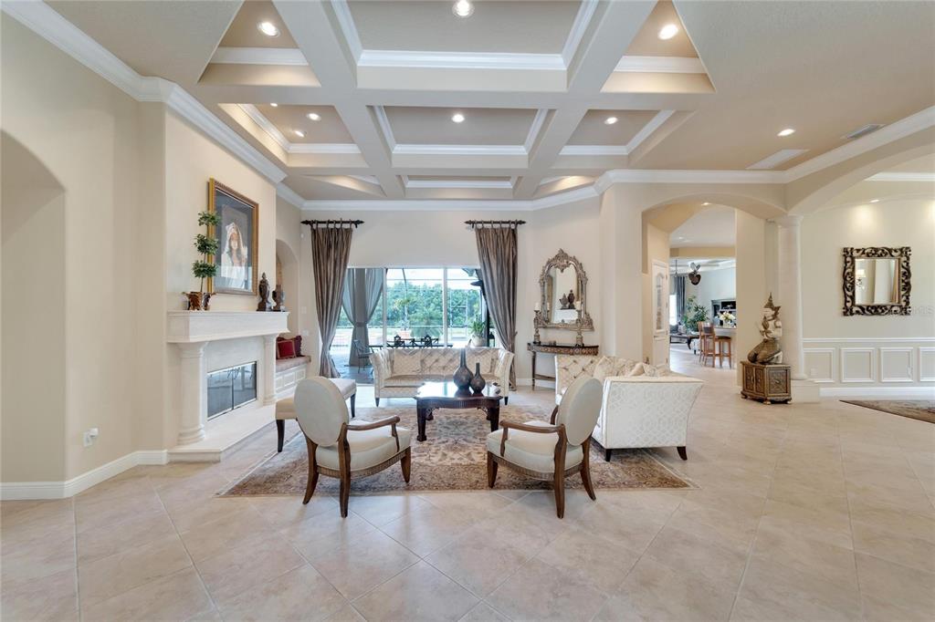 15101 Kestrelglen Way Lithia, FL 33547 - Photo 18 of 75 a living room with furniture and a large window