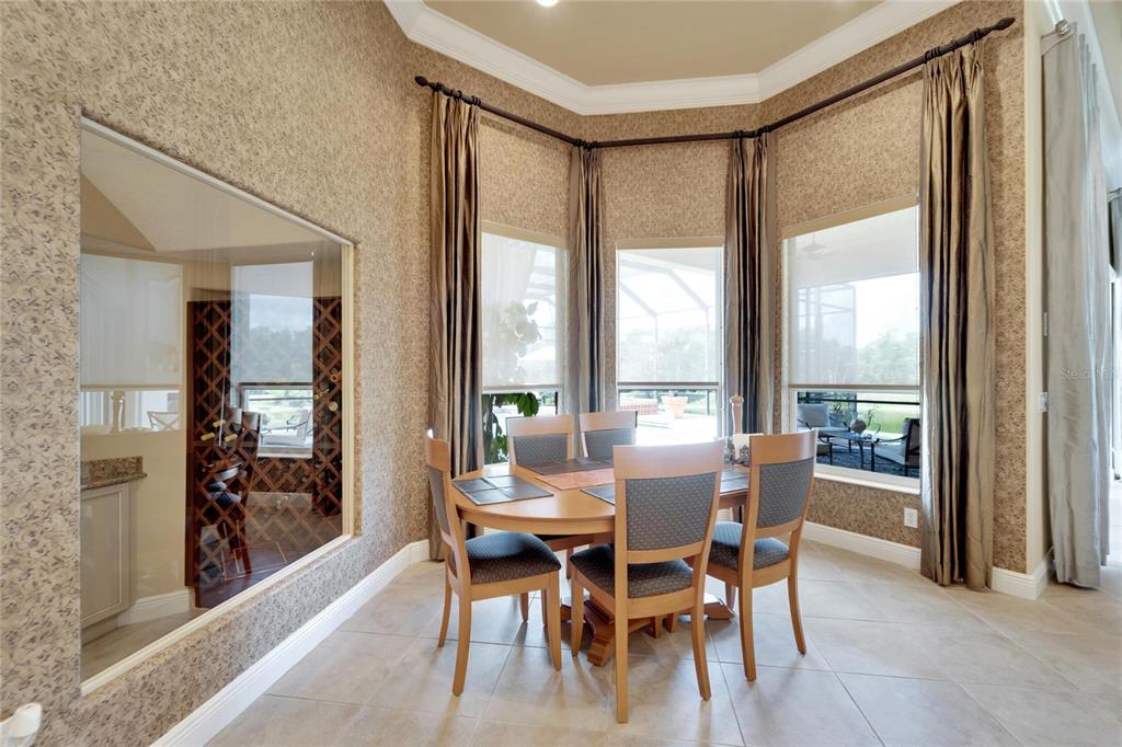 15101 Kestrelglen Way Lithia, FL 33547 - Photo 33 of 75 a view of a dining room with furniture and window