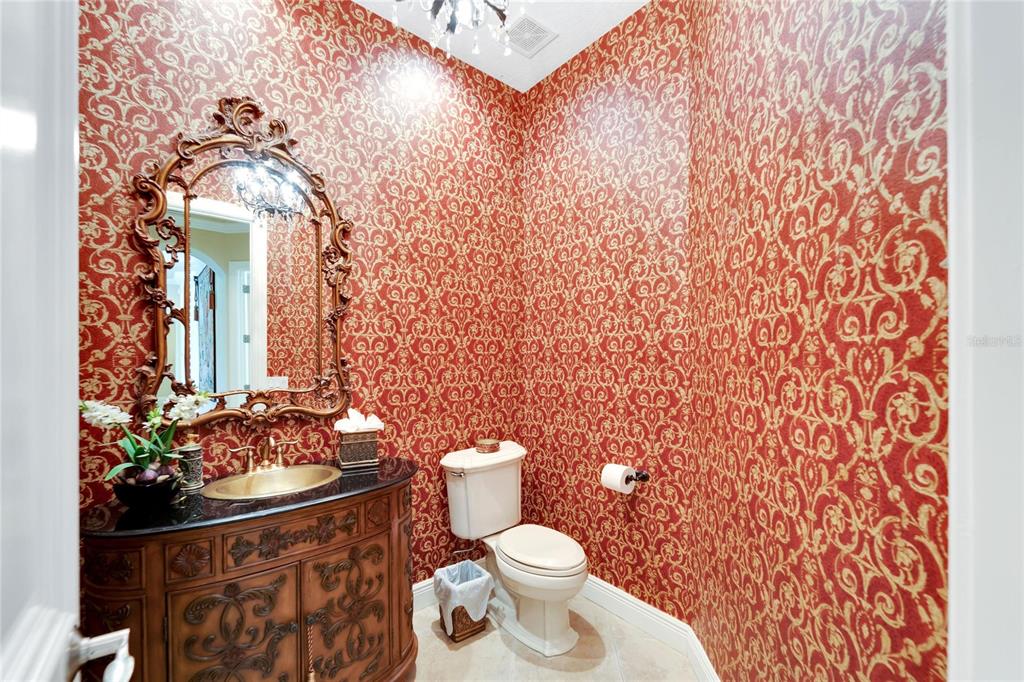 15101 Kestrelglen Way Lithia, FL 33547 - Photo 55 of 75 a bathroom with a sink mirror vanity and toilet