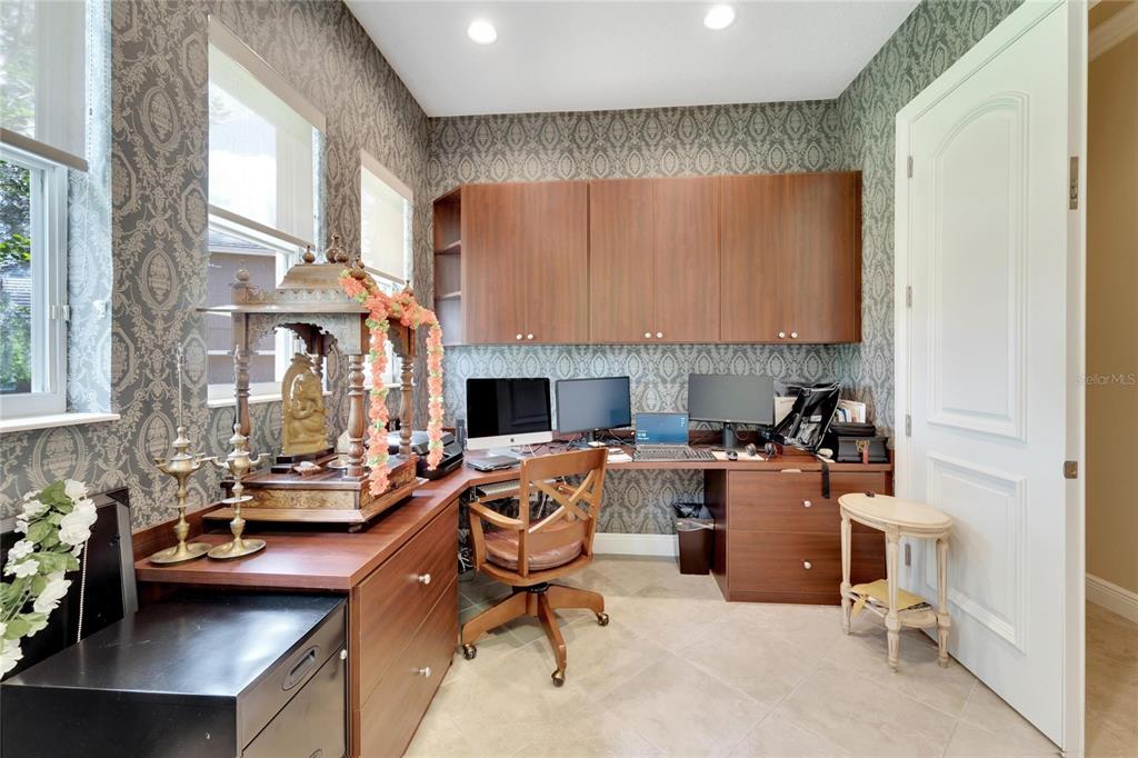 15101 Kestrelglen Way Lithia, FL 33547 - Photo 59 of 75 a view of a workspace with furniture and a window