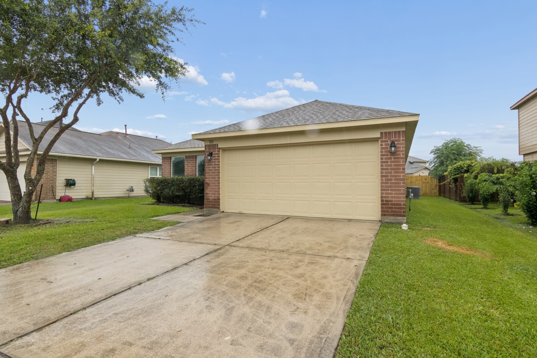 7811 Adonis Avenue Baytown, TX 77521 - Photo 2 of 36 a front view of house with yard