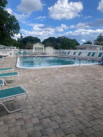 a view of swimming pool with mountain view