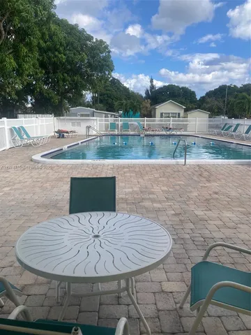 a view of a lake with a house