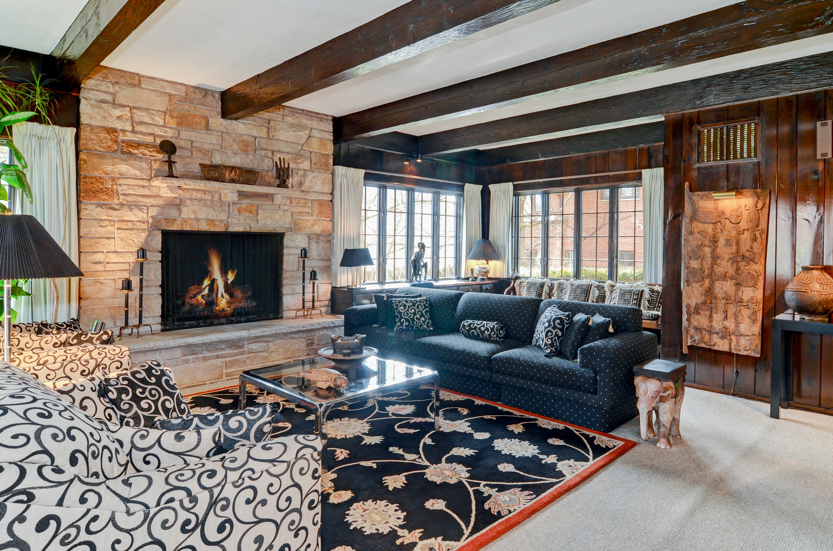 801 South County Line Road Hinsdale, IL 60521 - Photo 12 of 24 a living room with furniture windows and a fireplace