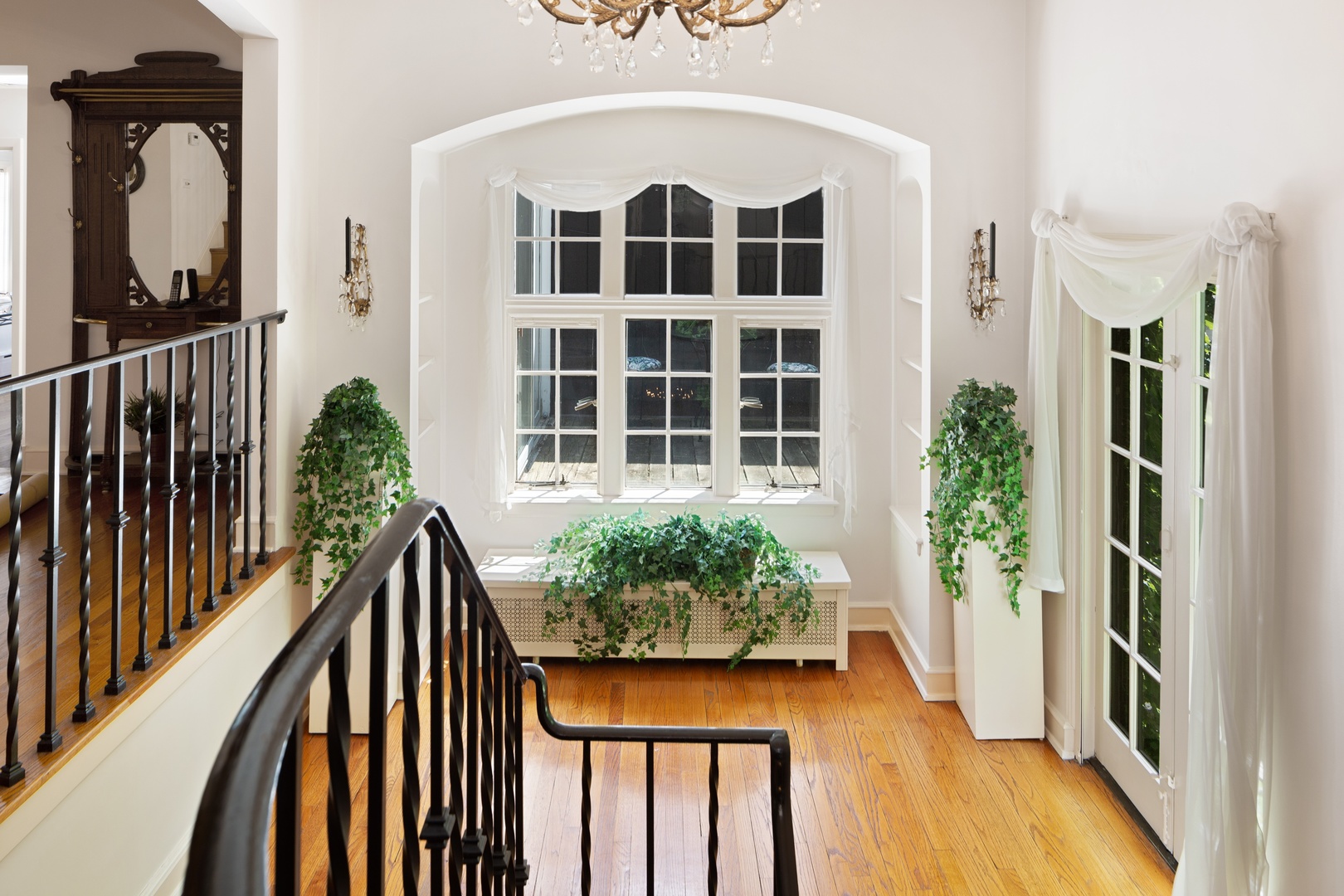 801 South County Line Road Hinsdale, IL 60521 - Photo 14 of 24 a view of a house with entryway and wooden floor