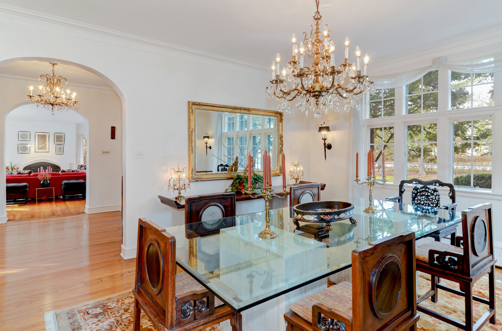 801 South County Line Road Hinsdale, IL 60521 - Photo 7 of 24 a view of a dining room with furniture and chandelier