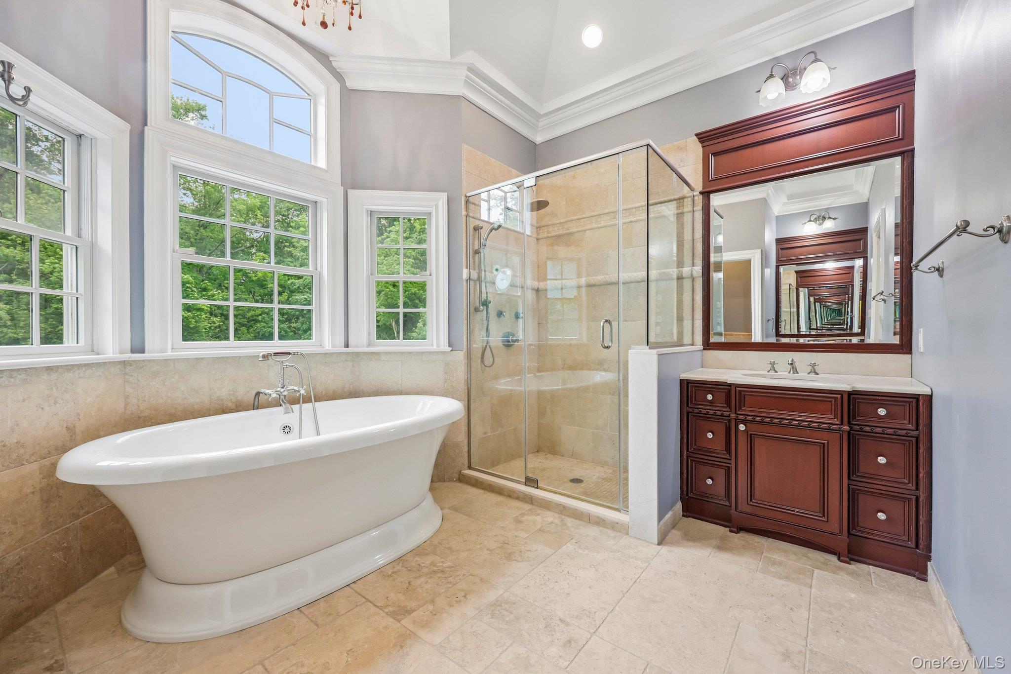 5 Mill Road Lloyd Harbor, NY 11743 - Photo 26 of 49 a spacious bathroom with a tub sink shower and mirror