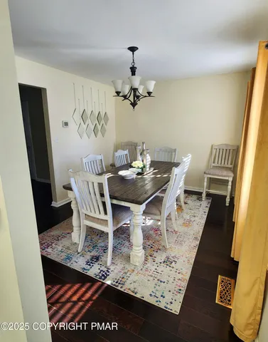 a bathroom with a sink vanity and mirror