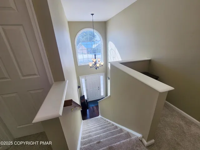 a bedroom with a bed and a cabinets