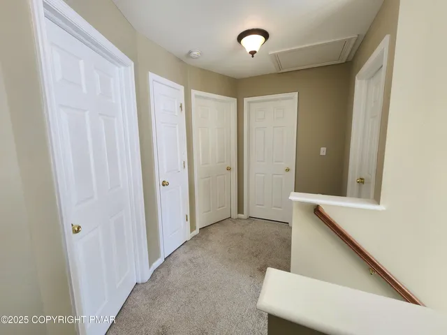 a bedroom with a bed and dresser