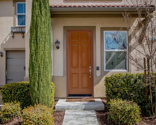 a view of entrance gate of a house