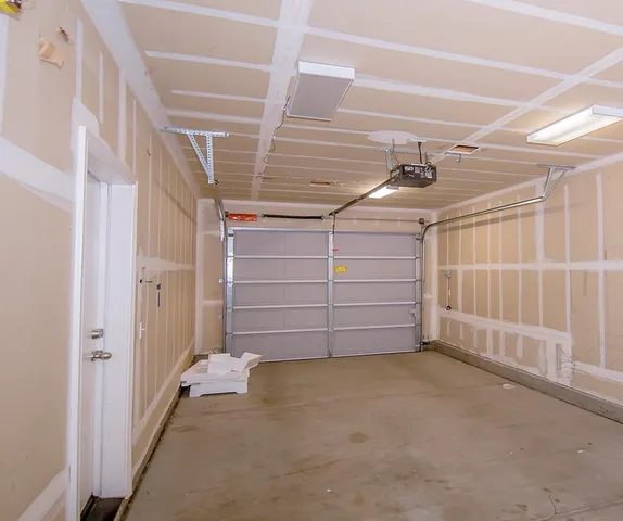 a view of a house with a palm tree