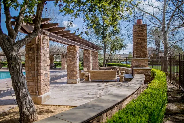 a view of a park with large trees