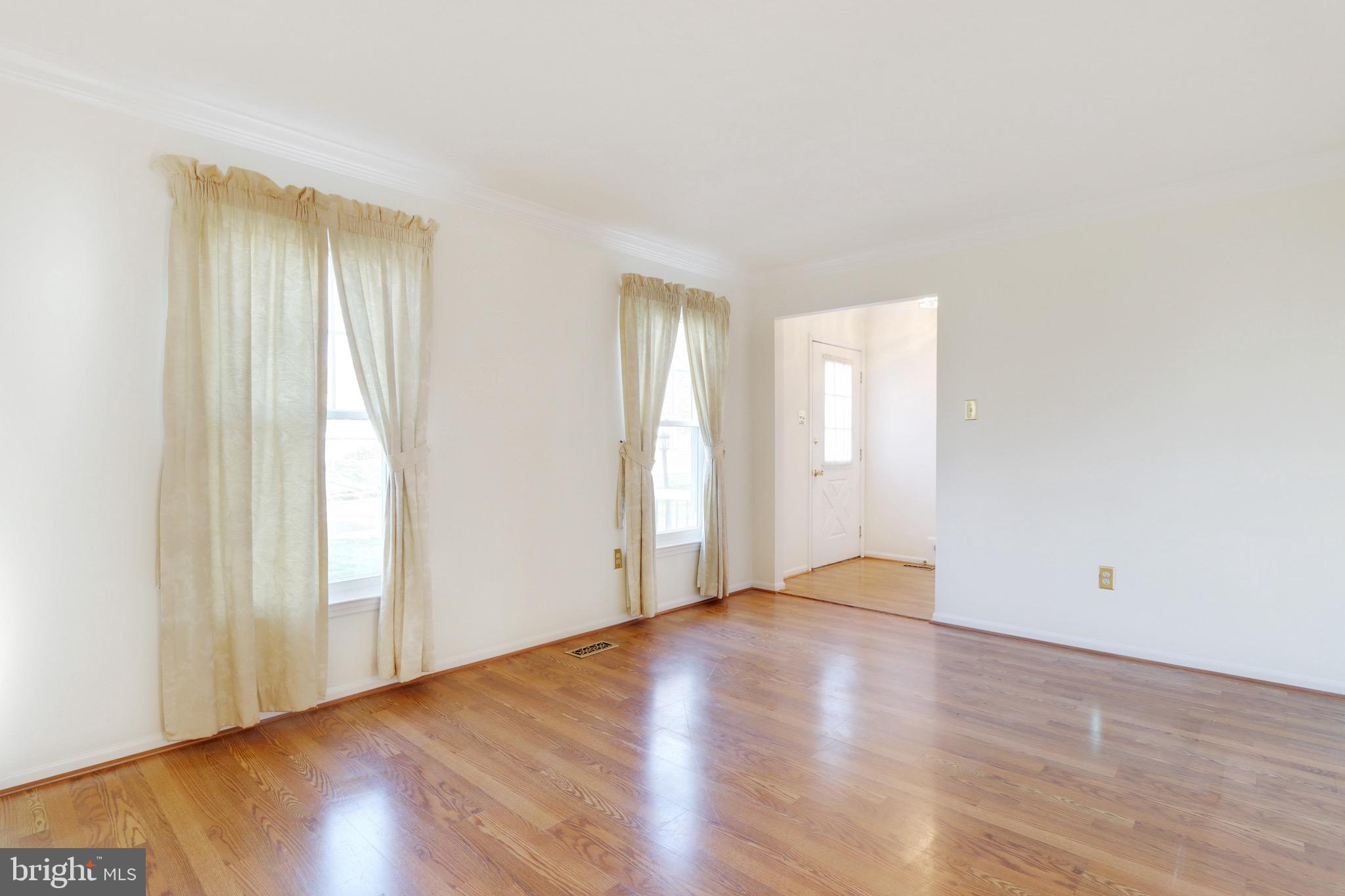 6678 Slacks Road Eldersburg, MD 21784 - Photo 4 of 42 Dining Room adjacent to Living Room w/ Hardwood