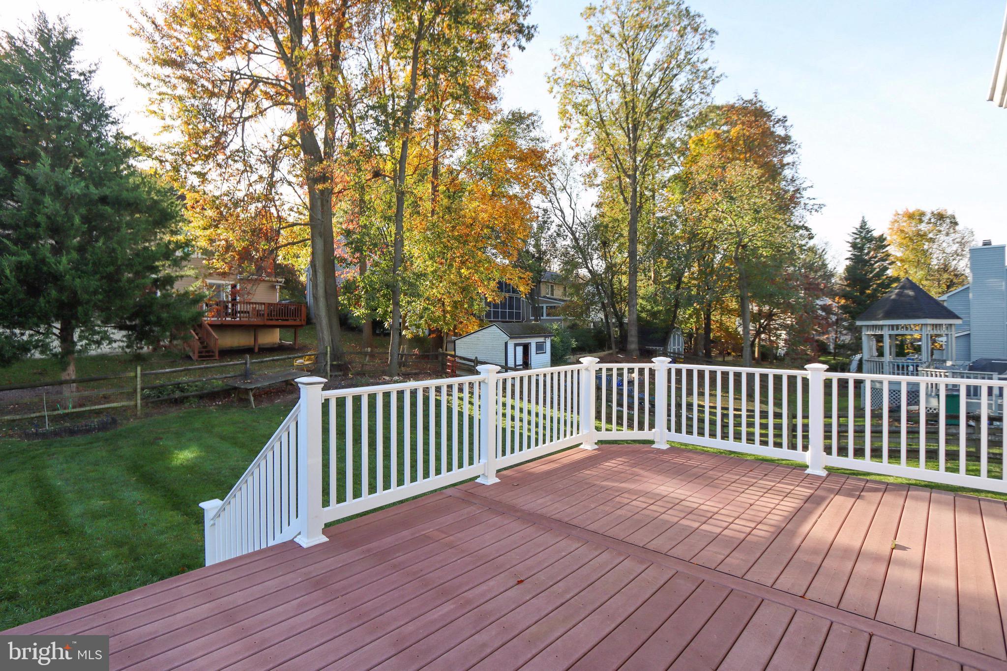 6678 Slacks Road Eldersburg, MD 21784 - Photo 38 of 42 Deck w/ Large Fenced in Backyard