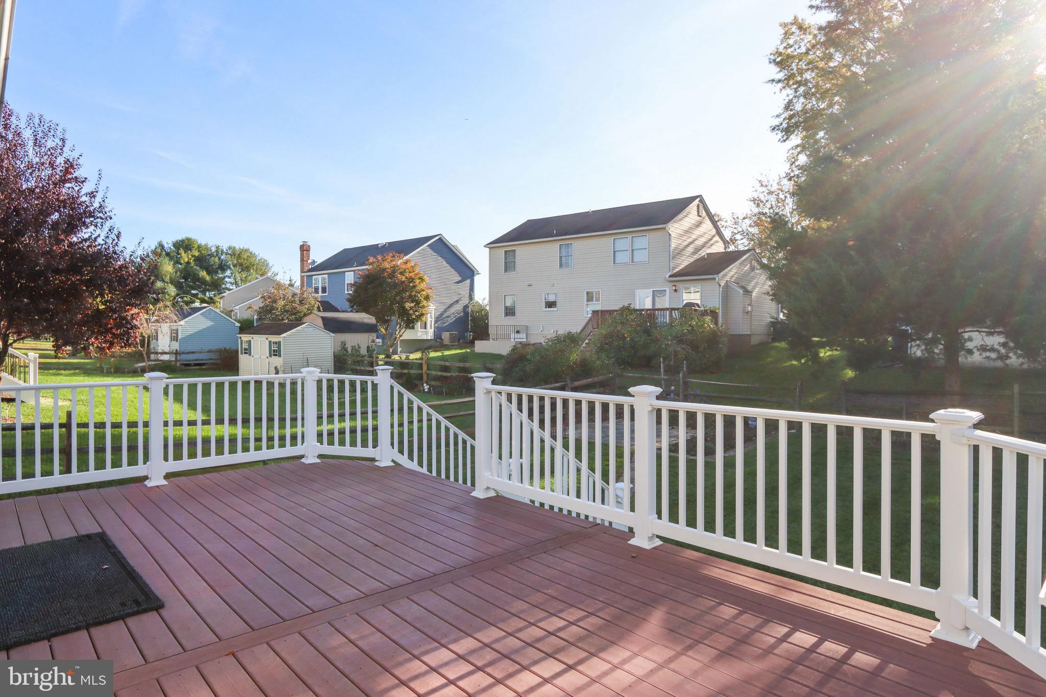 6678 Slacks Road Eldersburg, MD 21784 - Photo 39 of 42 Deck w/ Large Fenced in Backyard