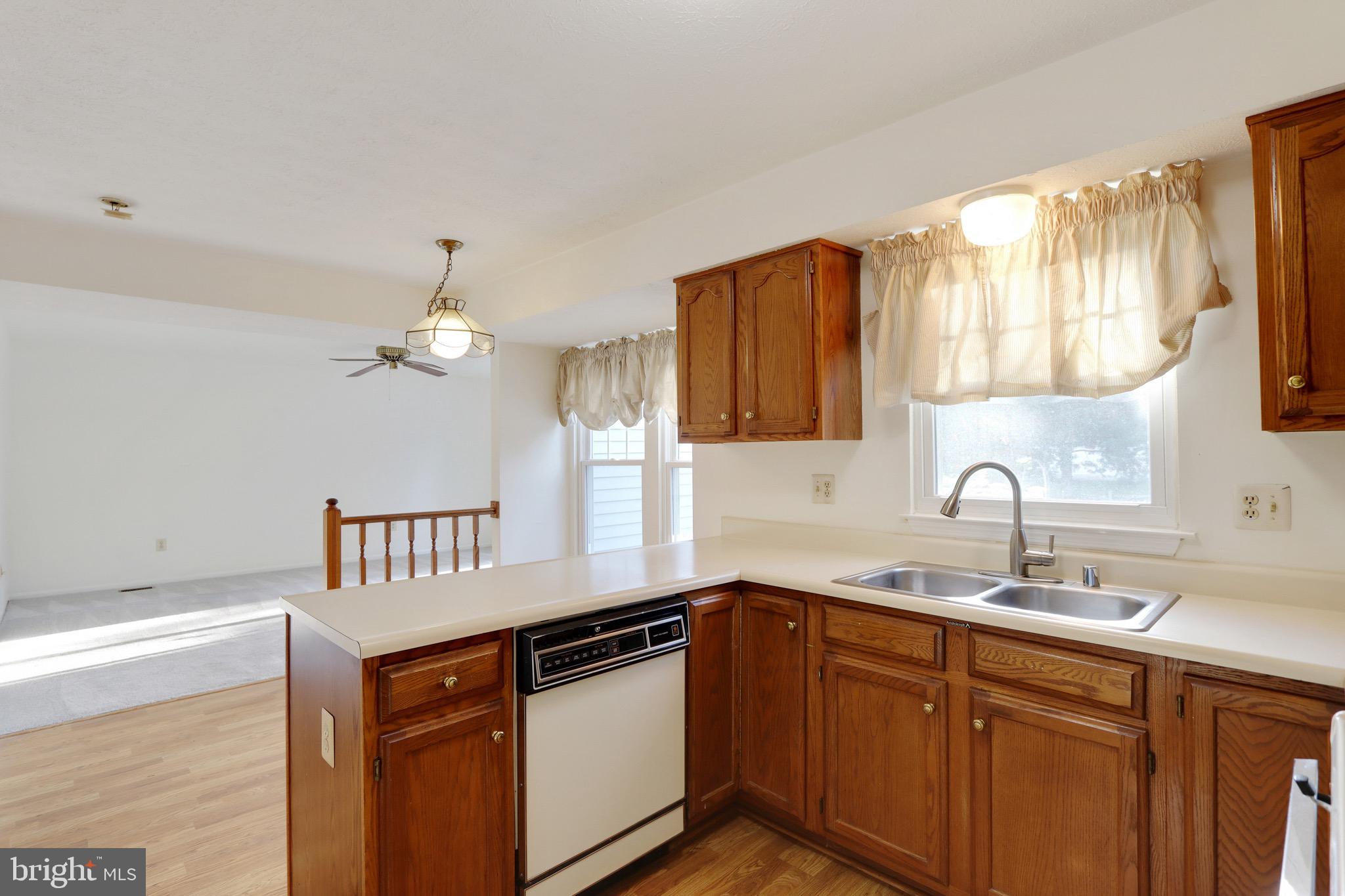 6678 Slacks Road Eldersburg, MD 21784 - Photo 6 of 42 Kitchen w/ Breakfast Room Open to Family Room
