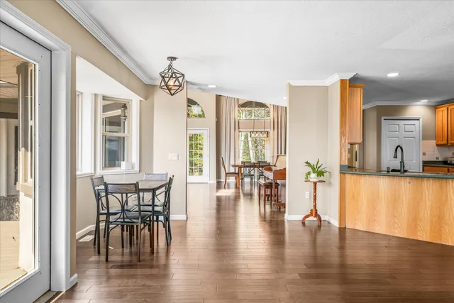 a kitchen with stainless steel appliances a counter top space and a window