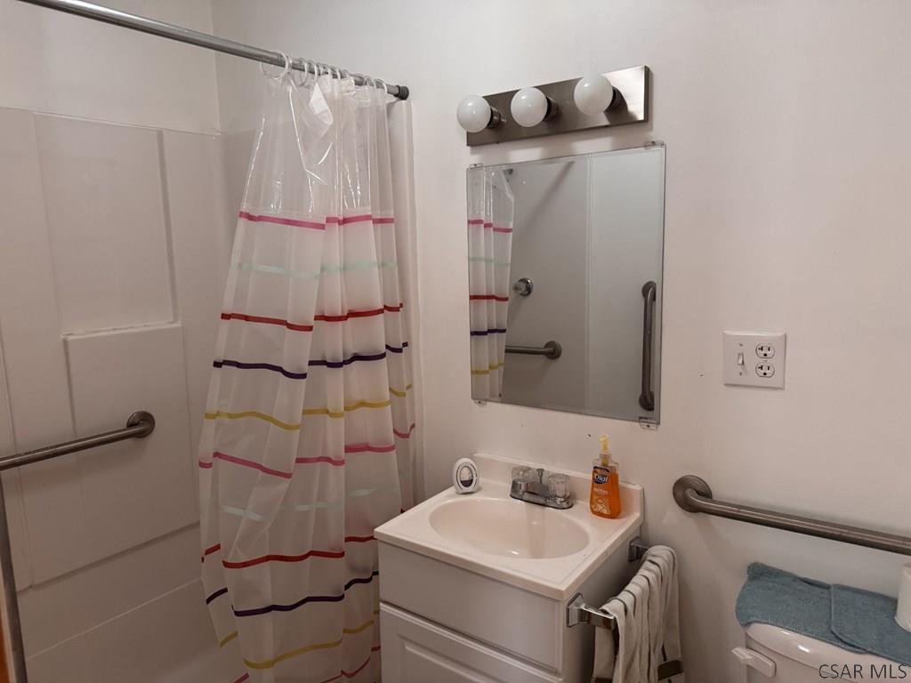 139 Reed Street Elmora, PA 15737 - Photo 21 of 23 a bathroom with a sink toilet and shower