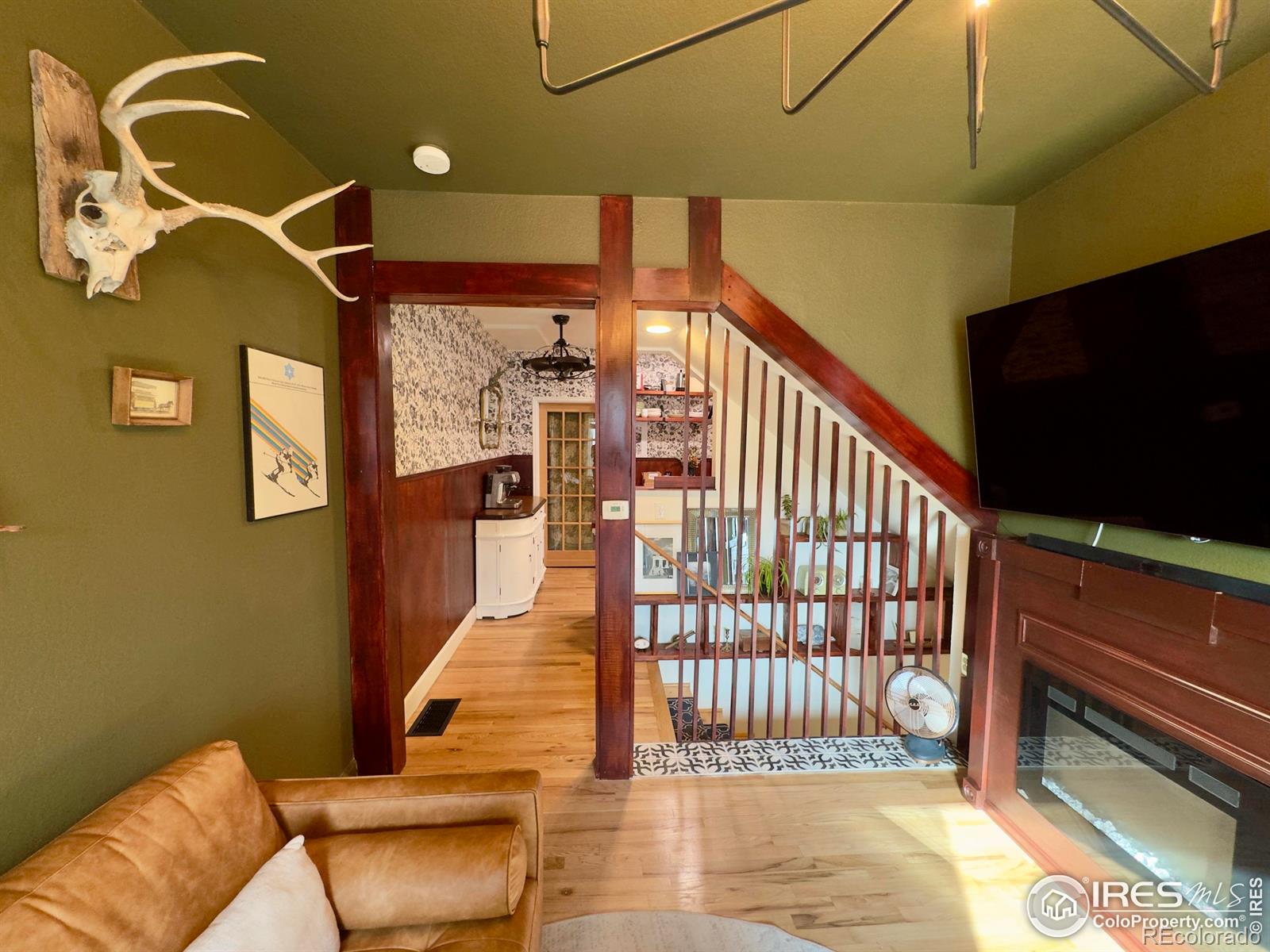 610 Logan Street, Unit 7 Denver, CO 80203 - Photo 4 of 19 a view of entryway and hall with wooden floor