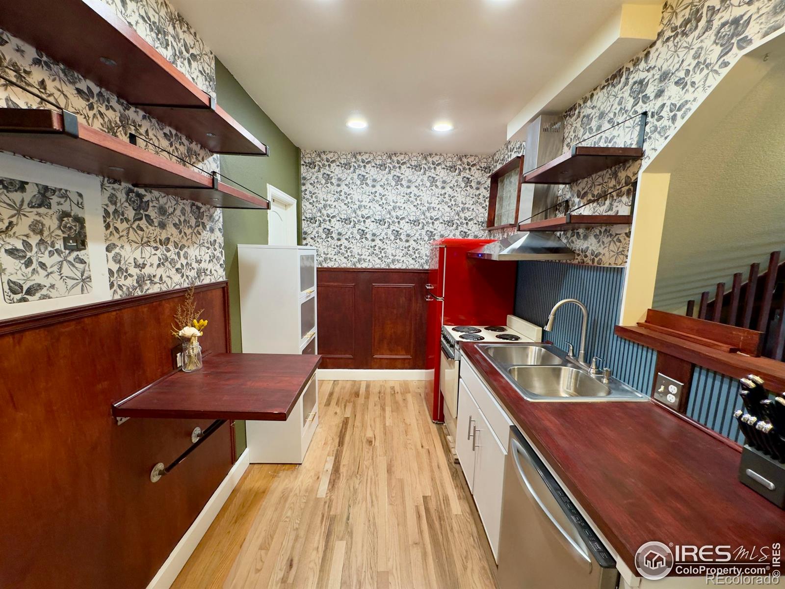 610 Logan Street, Unit 7 Denver, CO 80203 - Photo 8 of 19 a view of a living room and dining room