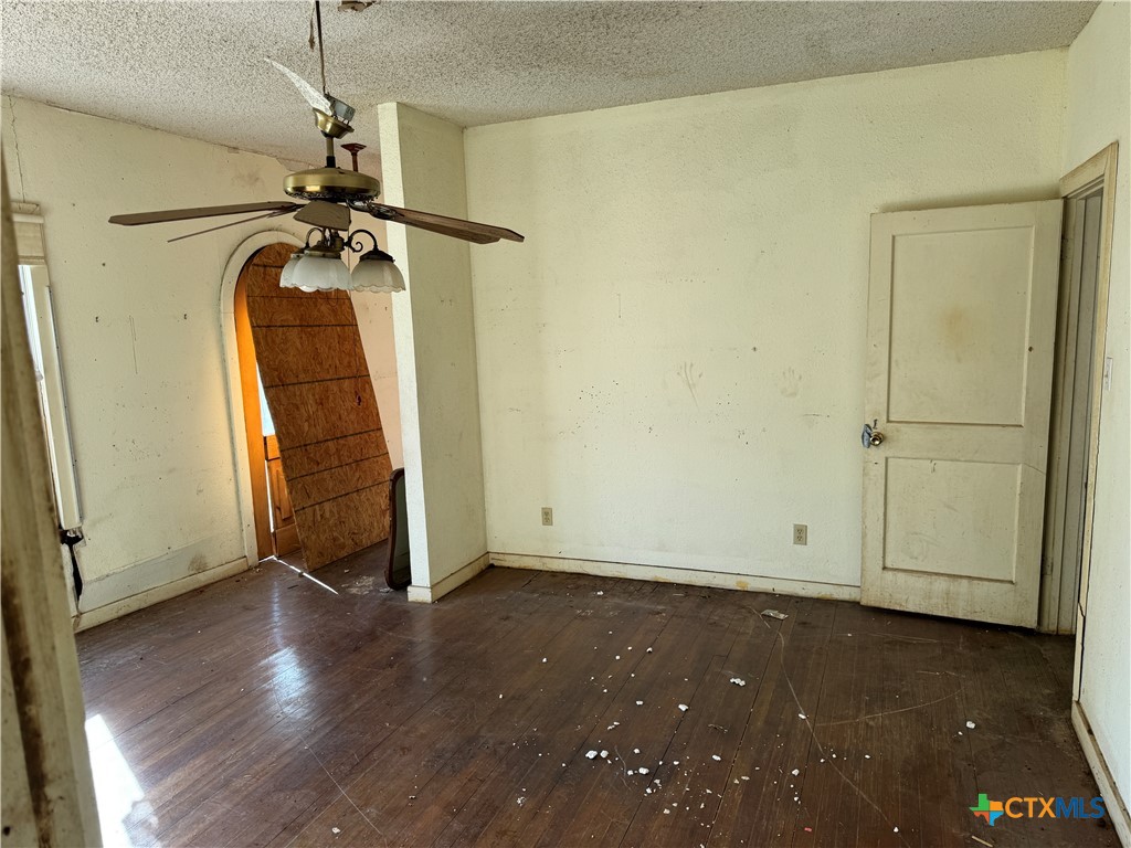 803 North 13th Street Temple, TX 76501 - Photo 4 of 20 a view of room with wooden floor