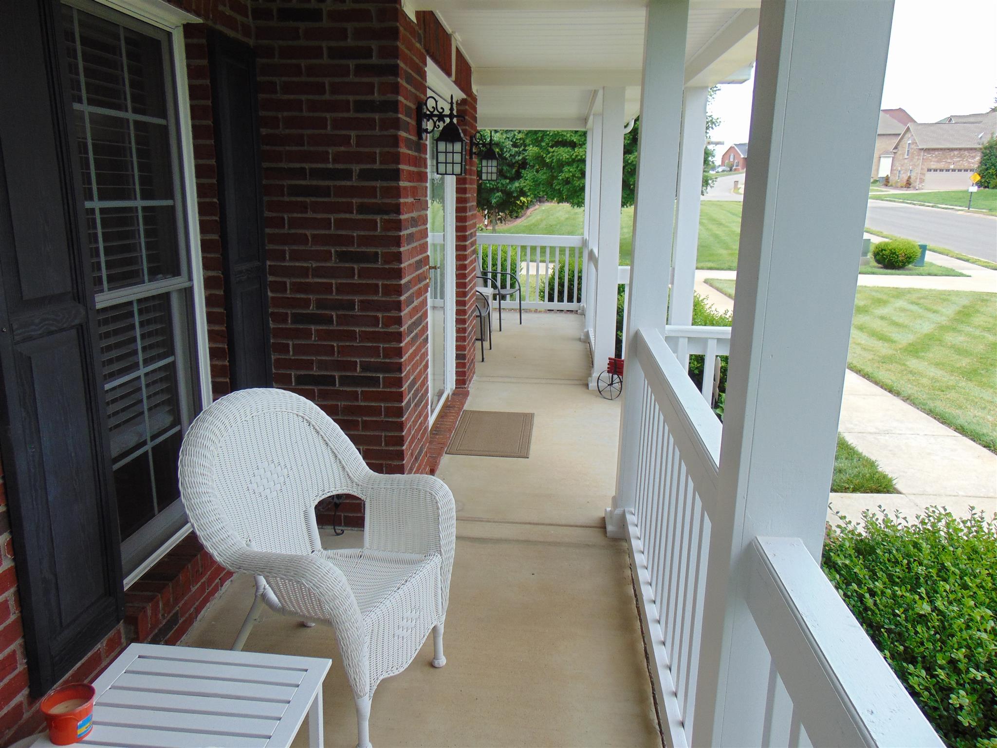 3564 Rabbit Run Trail Adams, TN 37010 - Photo 3 of 30 Relaxing front porch goes on forever!