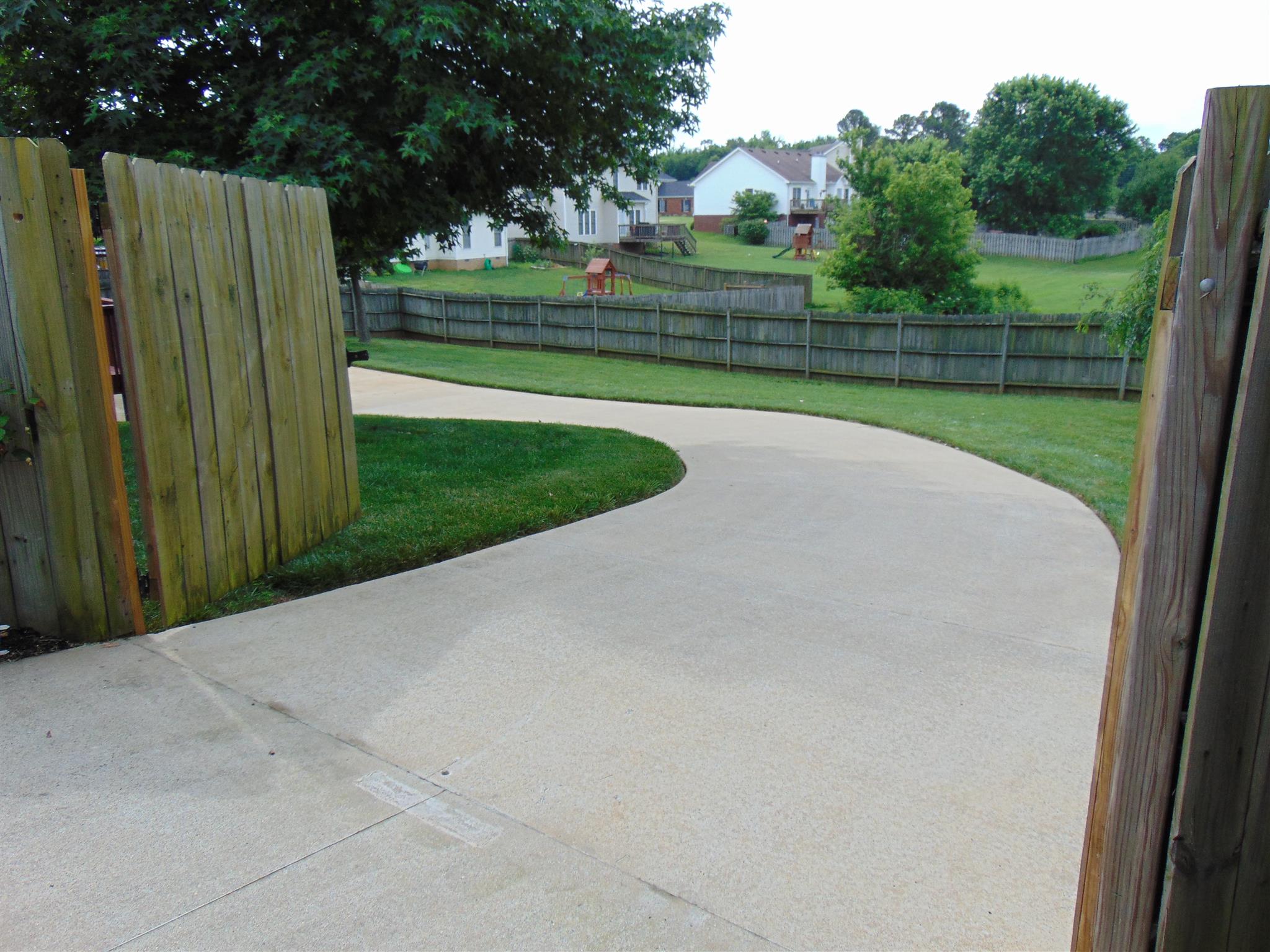 3564 Rabbit Run Trail Adams, TN 37010 - Photo 5 of 30 Double gate entrance going into backyard, leading w/private access to finished basement and 3rd car garage.