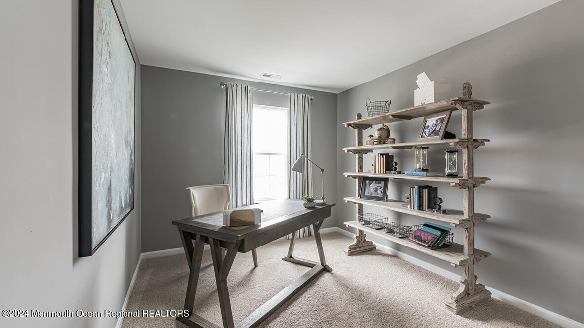 124 West 4th Street Howell, NJ 07731 - Photo 20 of 25 a view of a workspace with furniture and a window