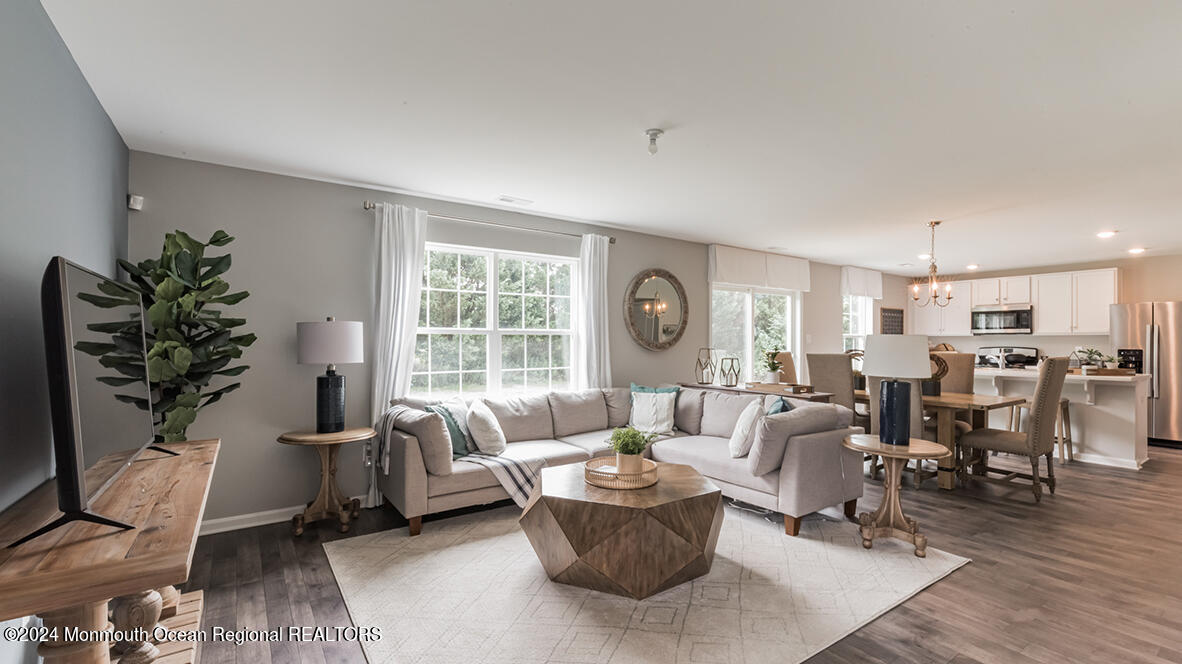 124 West 4th Street Howell, NJ 07731 - Photo 2 of 25 a living room with furniture and a large window