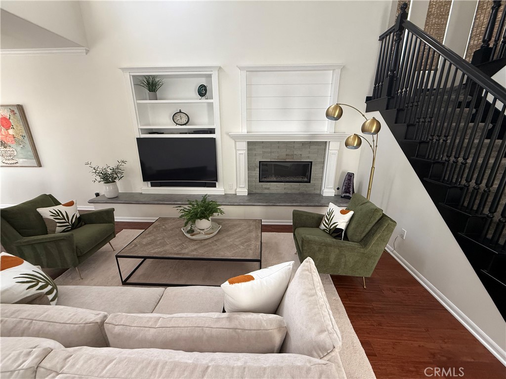 32 Marisol Newport Coast, CA 92657 - Photo 12 of 61 a living room with furniture and a fireplace