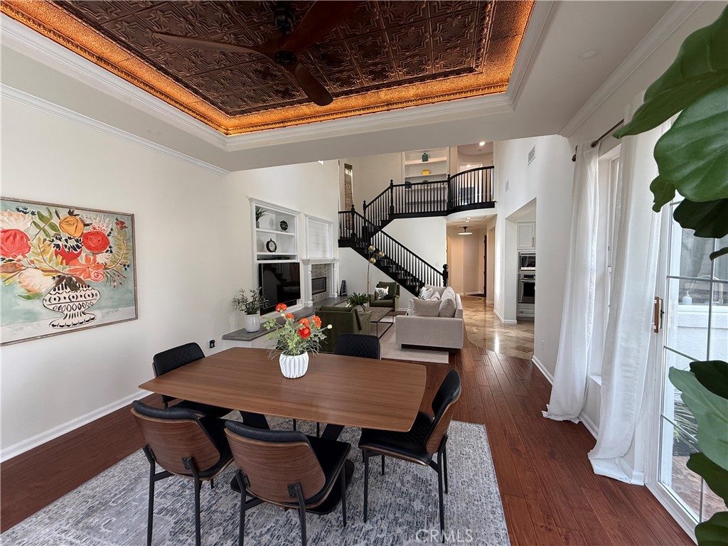 32 Marisol Newport Coast, CA 92657 - Photo 13 of 61 a view of a dining room with furniture and wooden floor