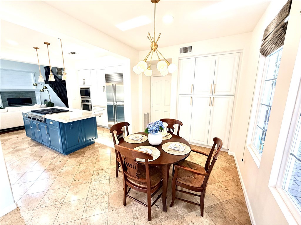 32 Marisol Newport Coast, CA 92657 - Photo 20 of 61 a view of a livingroom with furniture and a flat screen tv