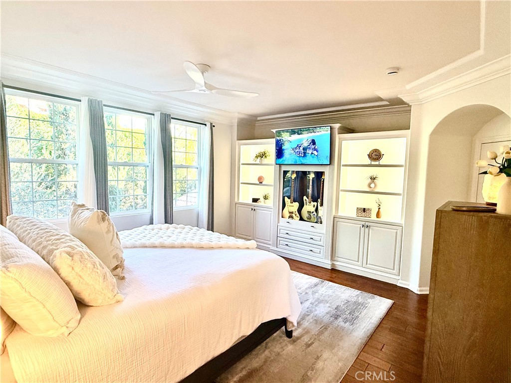 32 Marisol Newport Coast, CA 92657 - Photo 28 of 61 a bedroom with a bed cabinets and a large window