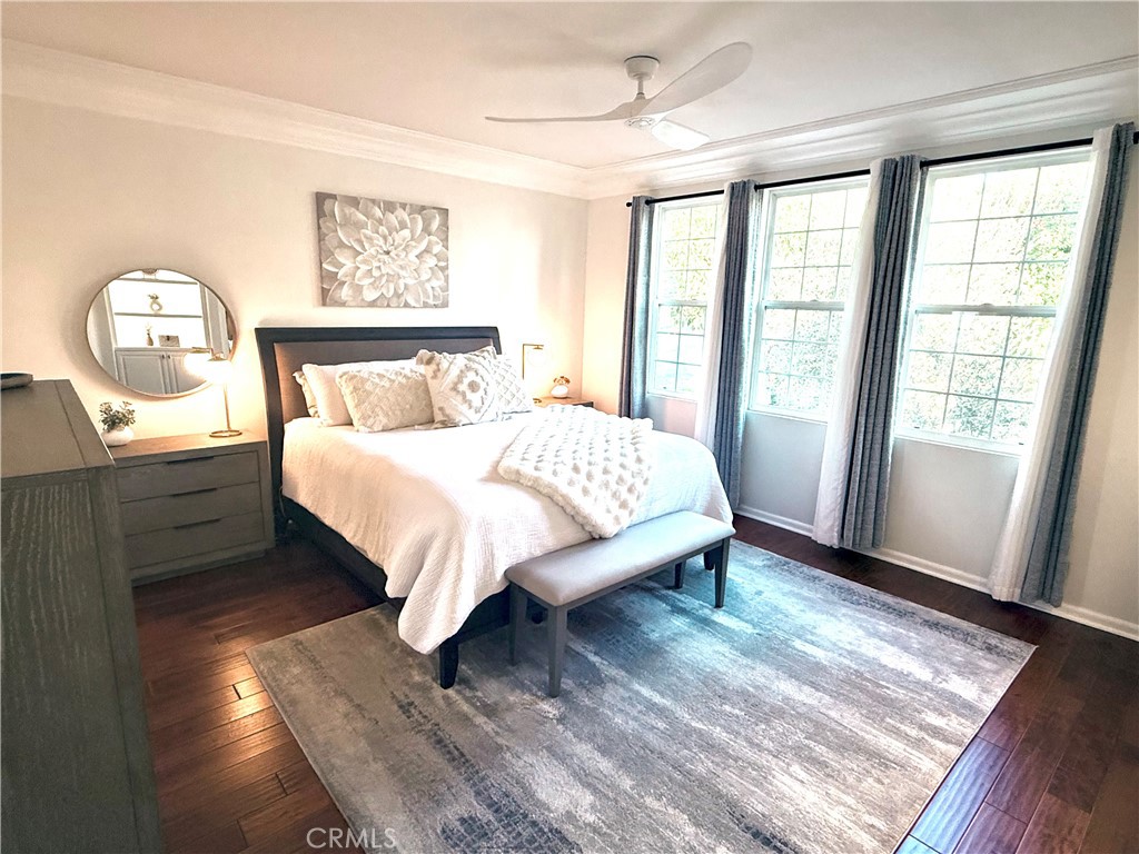 32 Marisol Newport Coast, CA 92657 - Photo 30 of 61 a bedroom with a bed lamp and a window