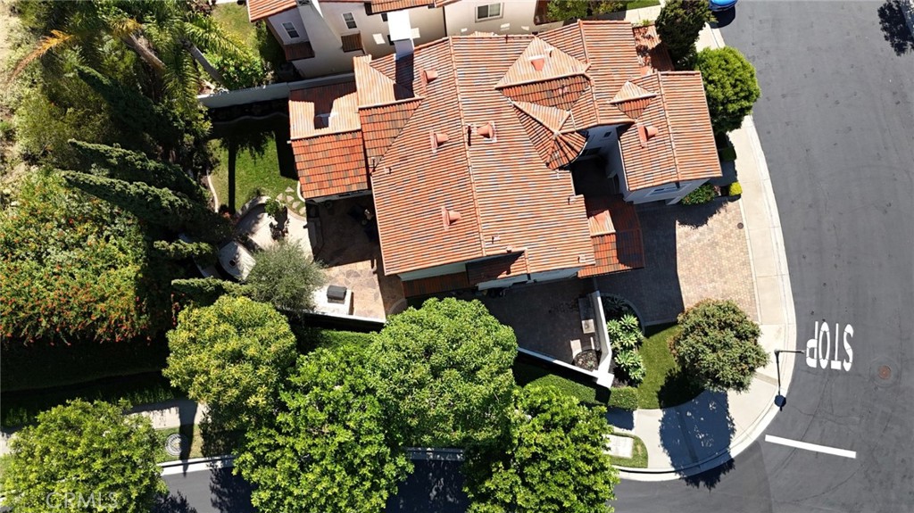32 Marisol Newport Coast, CA 92657 - Photo 3 of 61 an aerial view of a house with a yard and potted plants