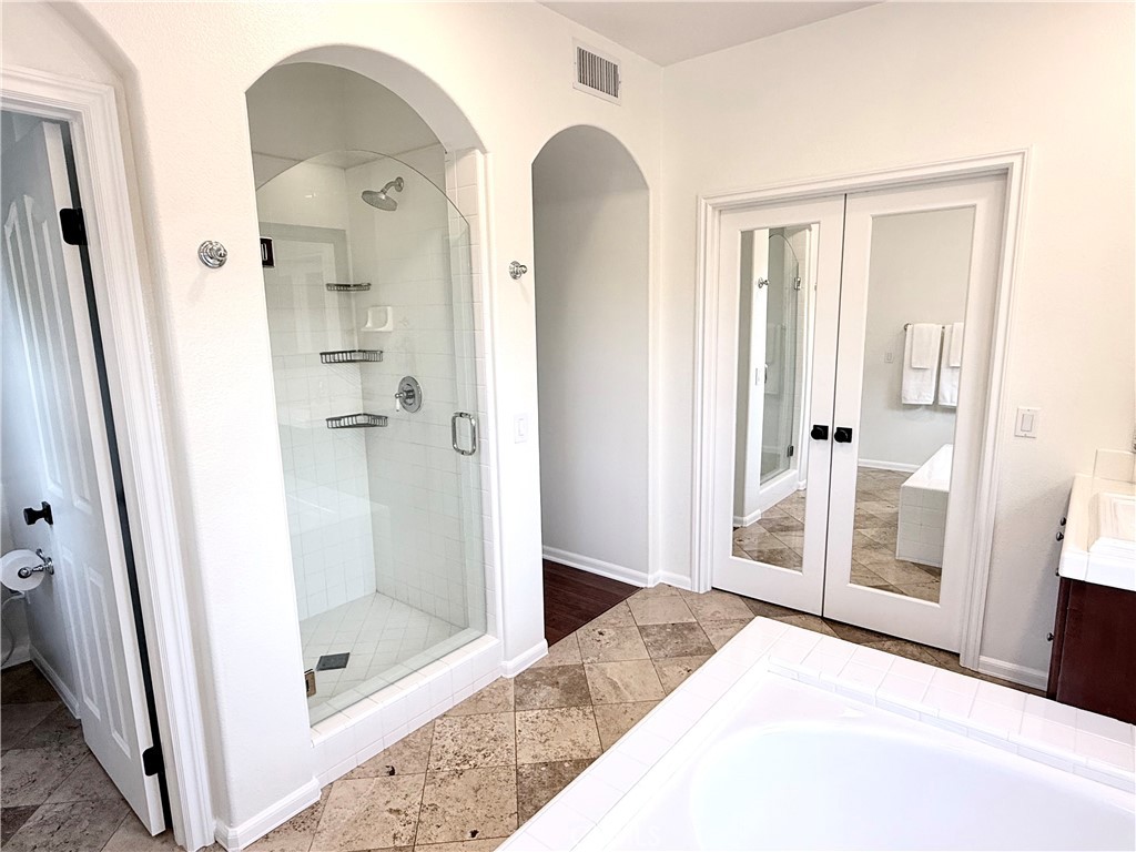 32 Marisol Newport Coast, CA 92657 - Photo 36 of 61 a bathroom with a shower and a tub