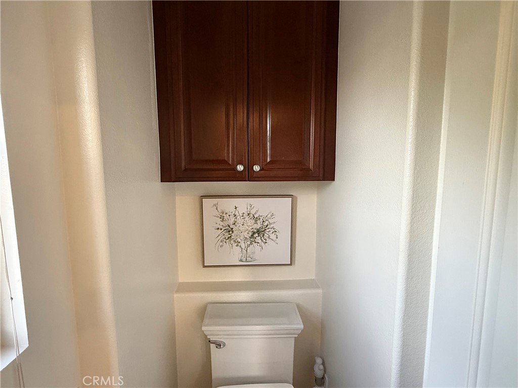 32 Marisol Newport Coast, CA 92657 - Photo 37 of 61 a bathroom with a toilet and a sink