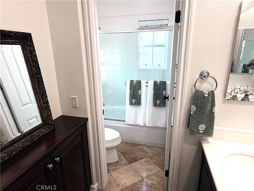 32 Marisol Newport Coast, CA 92657 - Photo 41 of 61 a bathroom with a sink a toilet and shower