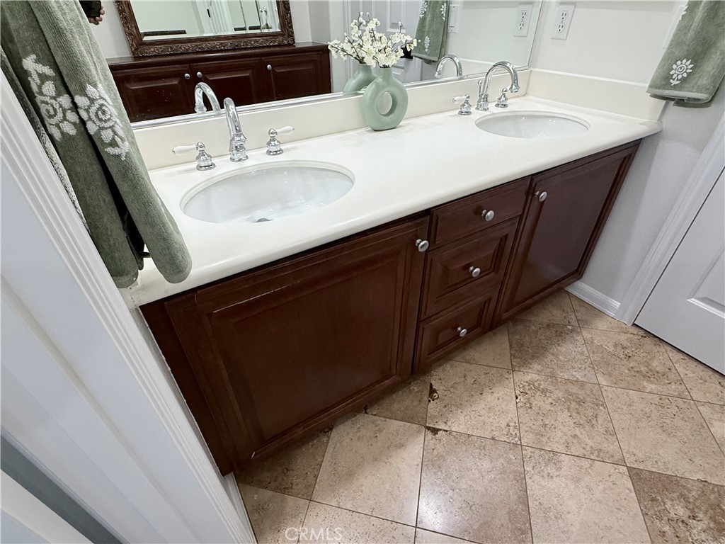 32 Marisol Newport Coast, CA 92657 - Photo 42 of 61 a sink with a mirror