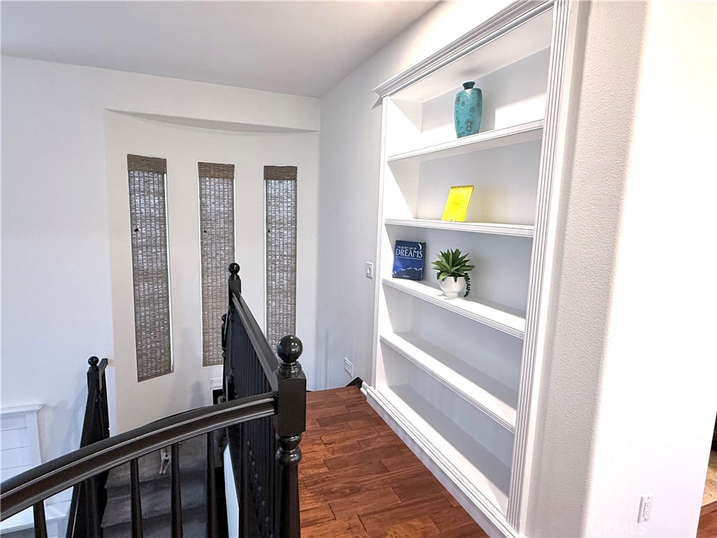 32 Marisol Newport Coast, CA 92657 - Photo 44 of 61 a view of staircase with wooden floor and wall painting