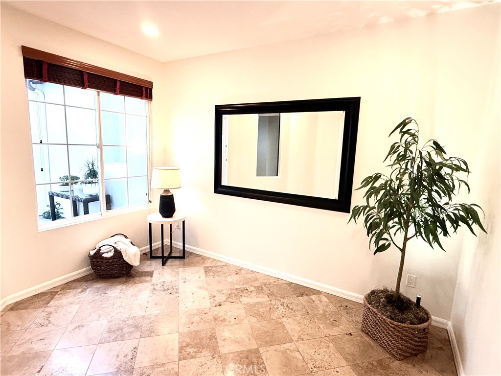 32 Marisol Newport Coast, CA 92657 - Photo 48 of 61 a living room with furniture and a window