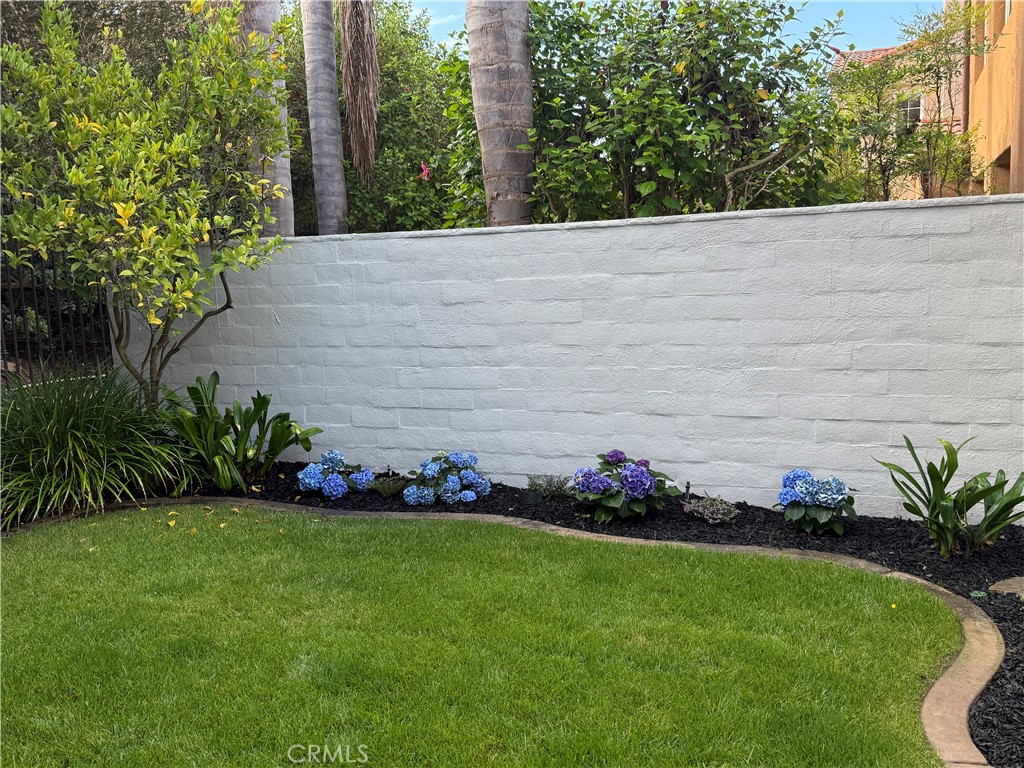 32 Marisol Newport Coast, CA 92657 - Photo 56 of 61 a view of a garden with flowers and trees